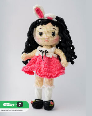 عروسک دختر مو فرفری با لباس صورتی